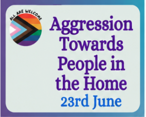 A sign with a progress pride flag and the words "Aggression Towards People in the Home" and "23rd June." The phrase "All Are Welcome" appears above the flag.